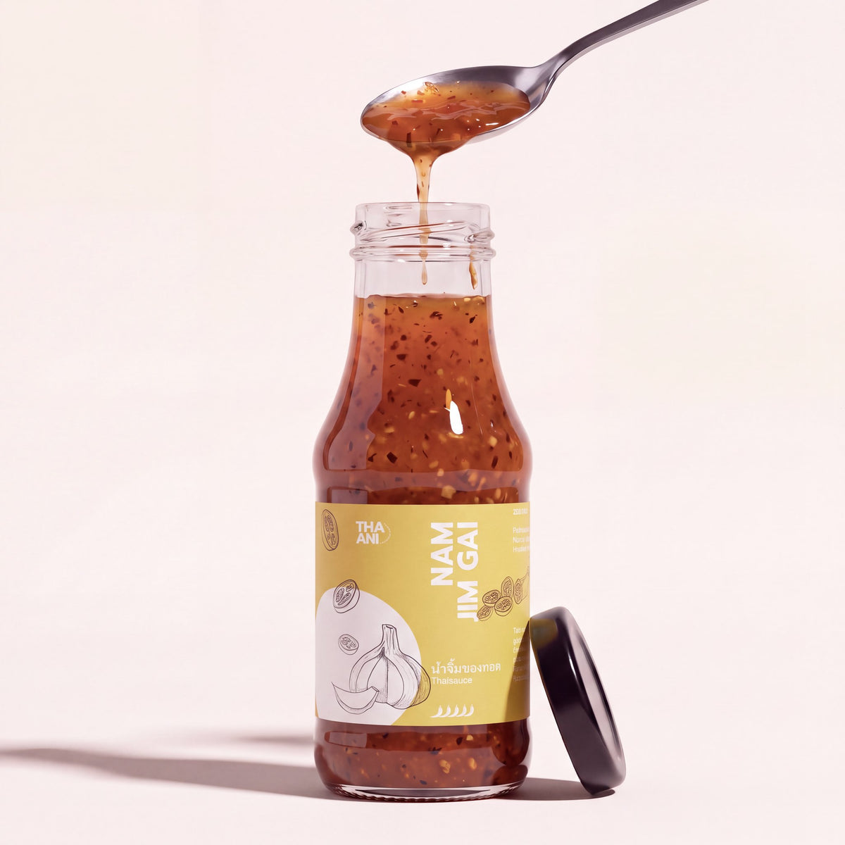 Nam Jim Gai: Flasche mit Löffel