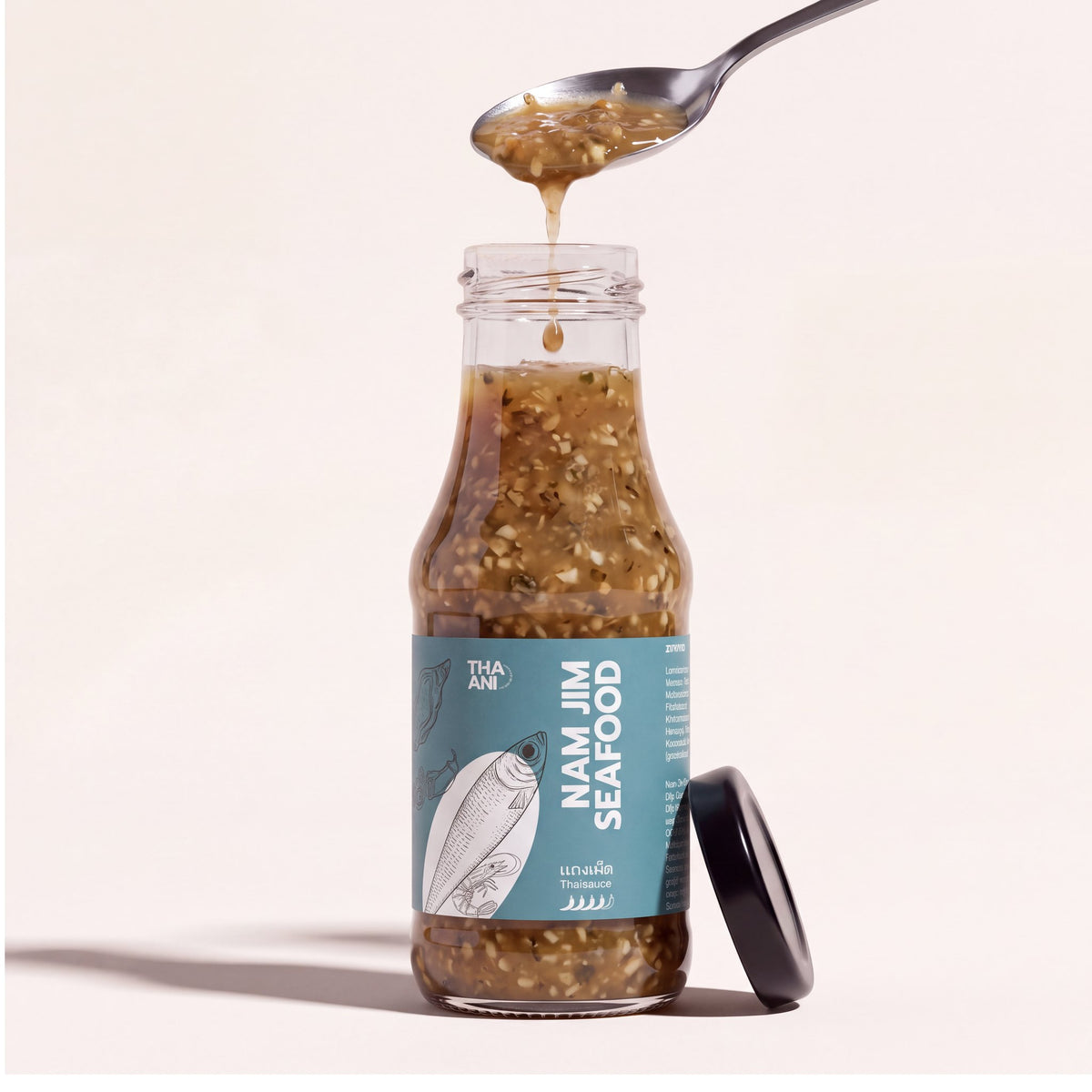 Nam Jim Seafood: Flasche mit Löffel