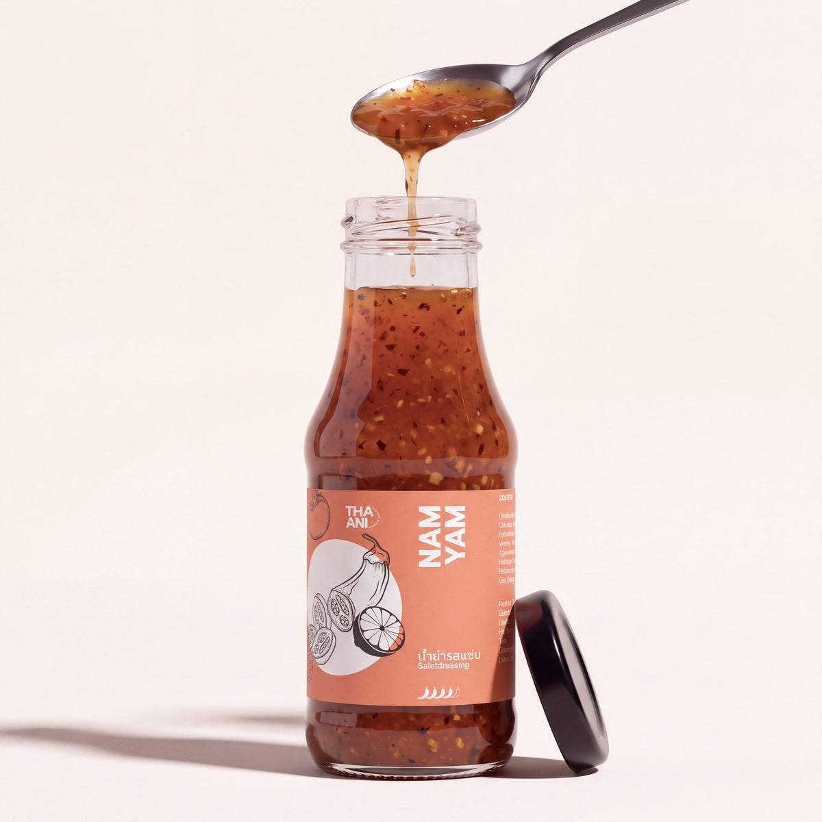 Nam Yam: Flasche mit Löffel