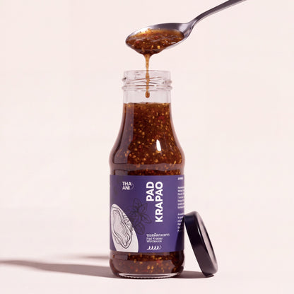 Pad Krapao: Flasche mit Löffel