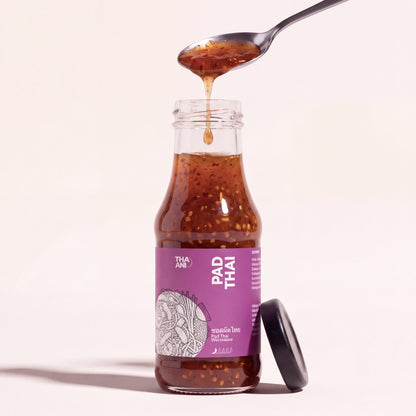 Pad Thai: Flasche mit Löffel