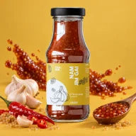 Nam Jim Gai — Sweet and sour dipping sauce on a coloured background